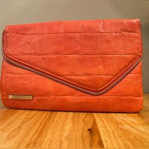 Orange envelope clutch from Nine West. Used once.